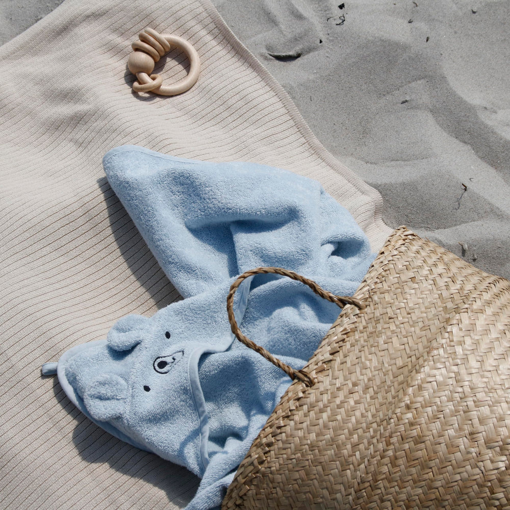 Gift-ready packaging of Huxie hooded towel set.