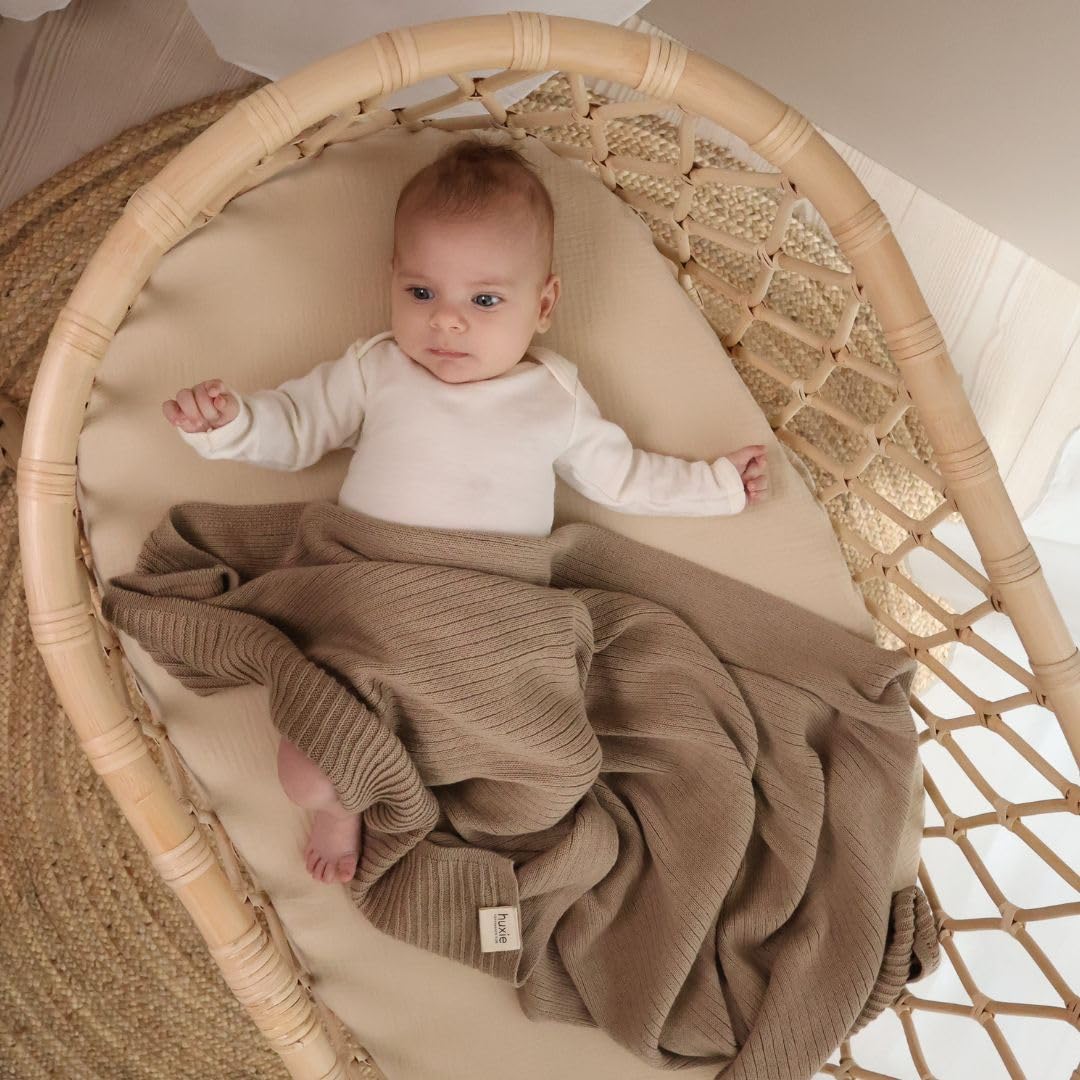 Huxie knitted baby blanket 30x40 size ideal for cuddles, stroller rides, and crib time.