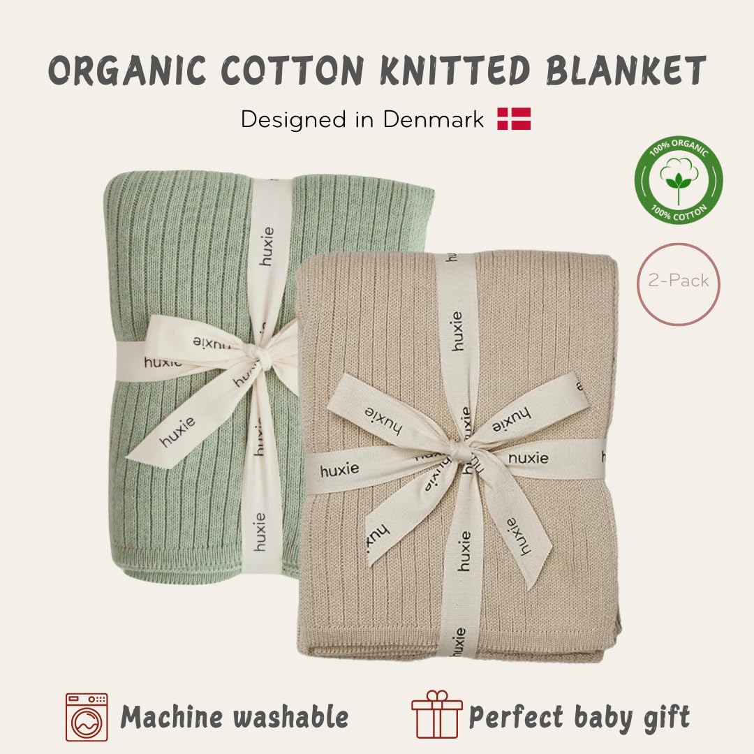 Huxie knitted baby blanket closeup organic cotton texture shows exceptional softness.