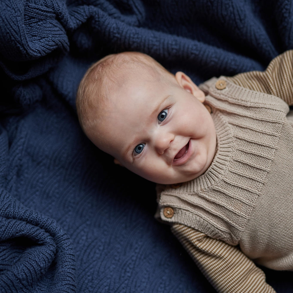 Huxie knitted baby blanket North Sea Blue soft fabric ideal for newborn snuggles