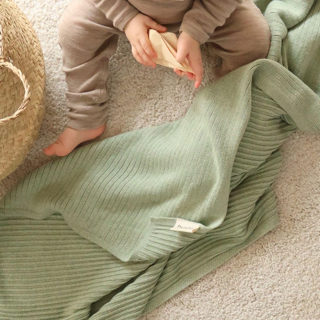 Huxie knitted baby blanket Roman Green gift ready suitable for baby showers.
