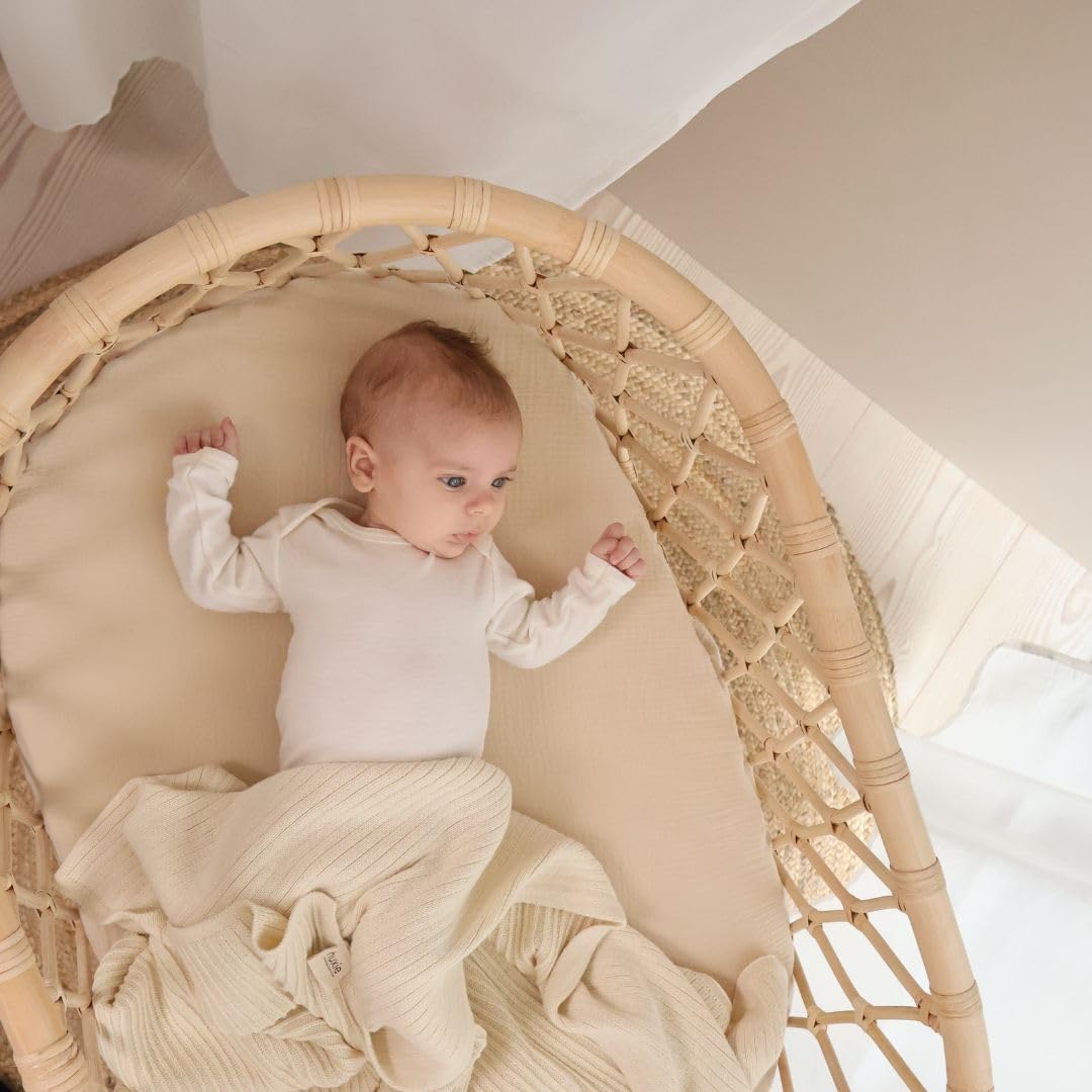 Huxie Knitted Baby Blanket folded neatly showing timeless neutral design