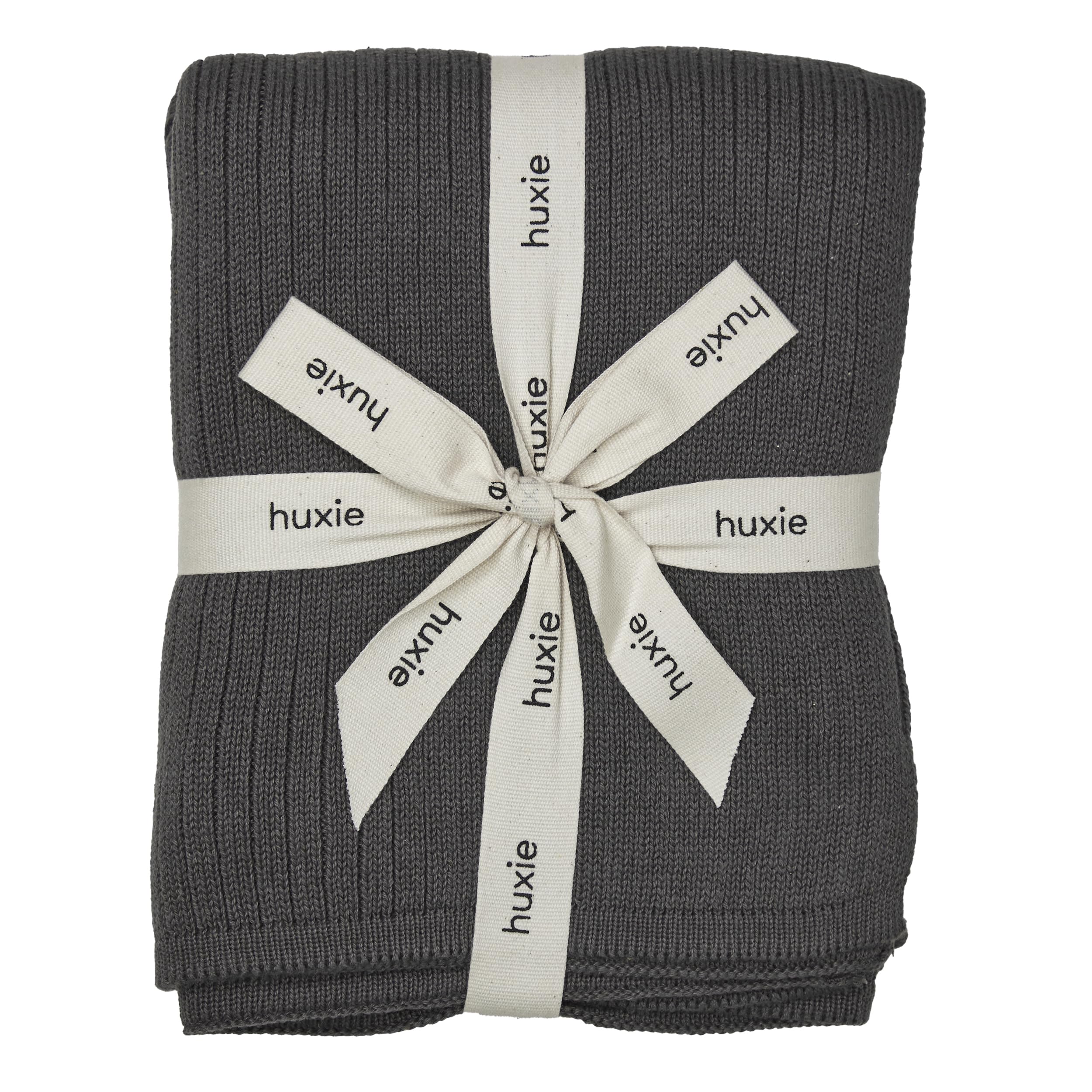 Huxie Knitted Baby Blanket closeup shows ultra-soft organic cotton texture for gentle newborn comfort.