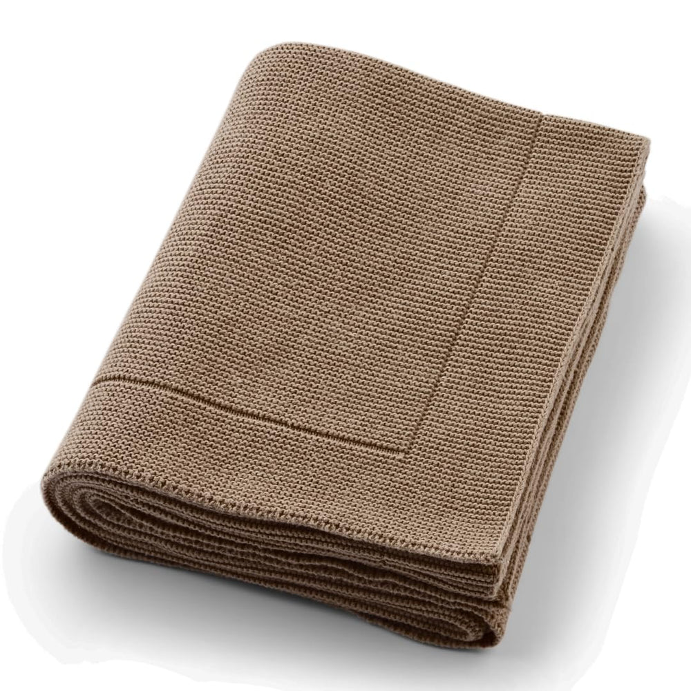Huxie knitted organic cotton baby blanket soft closeup reveals gentle skin-friendly texture for newborns