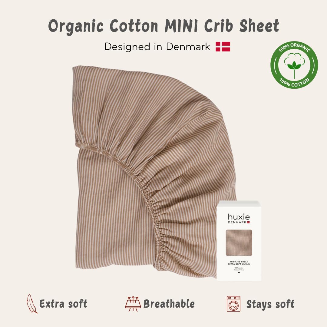 Huxie mini crib sheet gift-ready packaging signals a timeless baby shower gift idea.