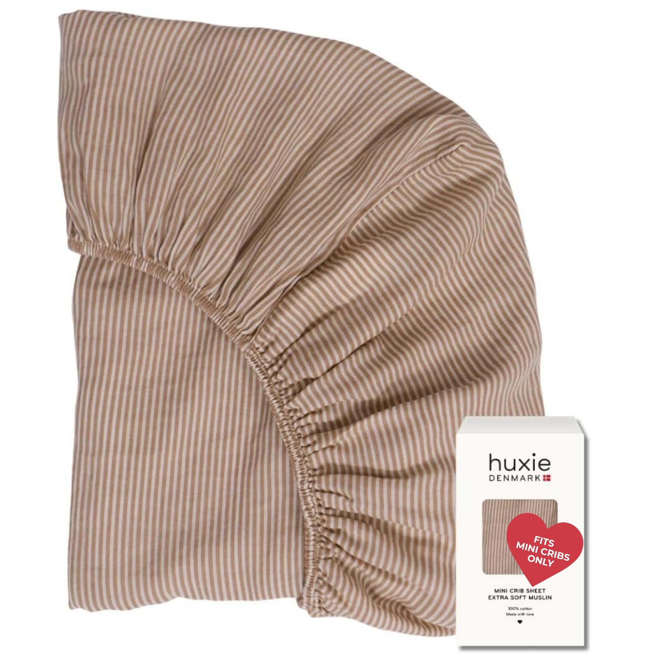 Huxie mini crib sheet Natural Stripe close-up shows ultra-soft organic cotton for baby comfort.