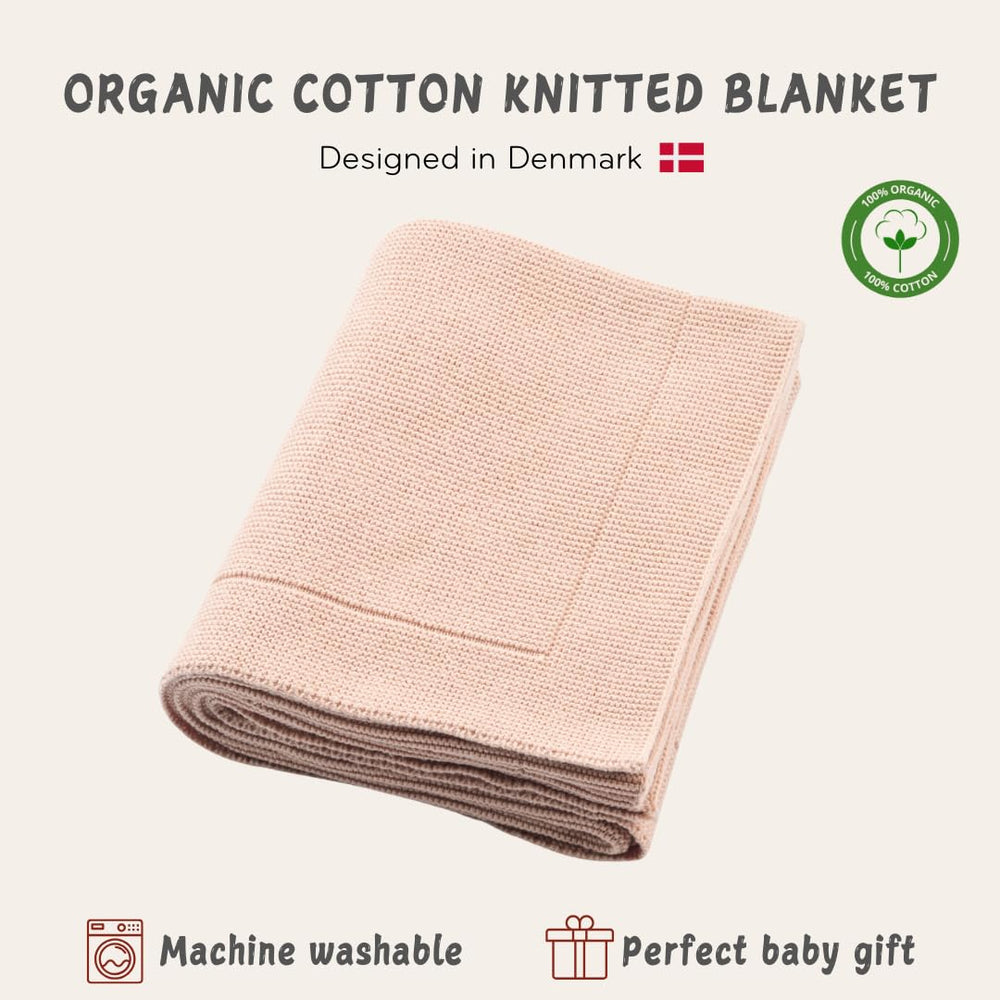 Huxie organic cotton blanket in nursery, all-season softness.
