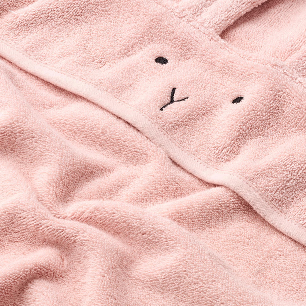 Huxie organic cotton weave detail: breathable fabric gentle on sensitive skin.