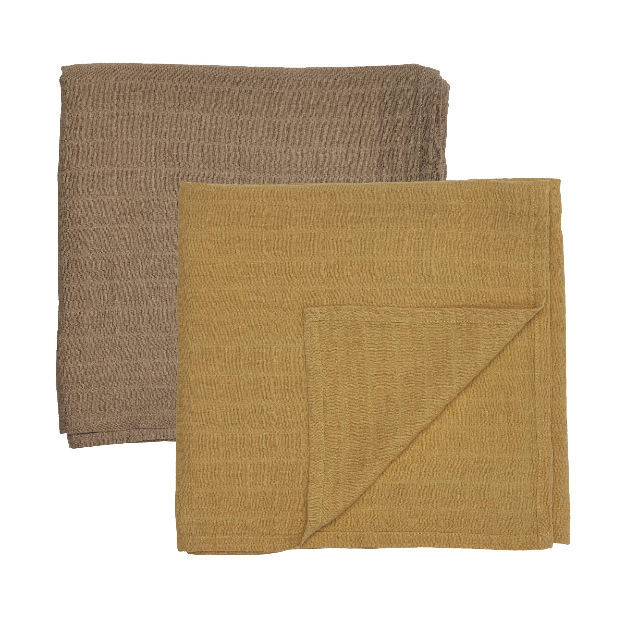 Huxie Swaddle autumn yellow closeup—soft organic muslin for newborn comfort