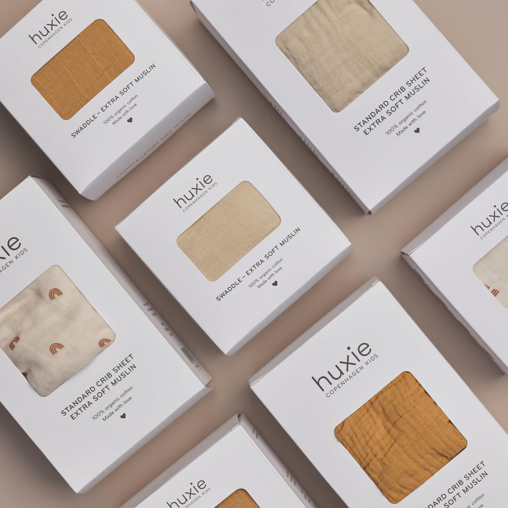 Huxie Swaddle Autumn Yellow packaging highlights gift-ready presentation
