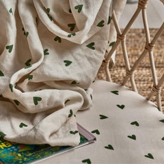 Huxie ultra-soft breathable sheet highlights smooth touch for baby comfort.