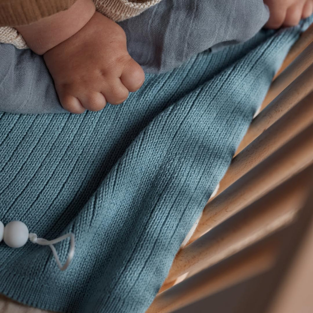 Huxie blanket after washing showing durable soft fibers
