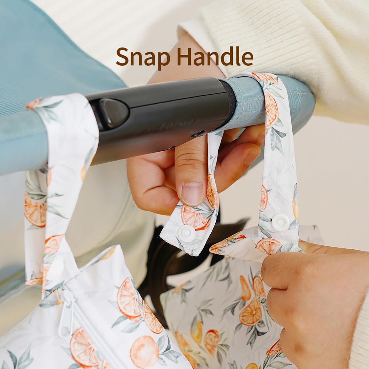 HZNOO bag-button-loop-hanging use shows hands-free access in stroller or gym locker.