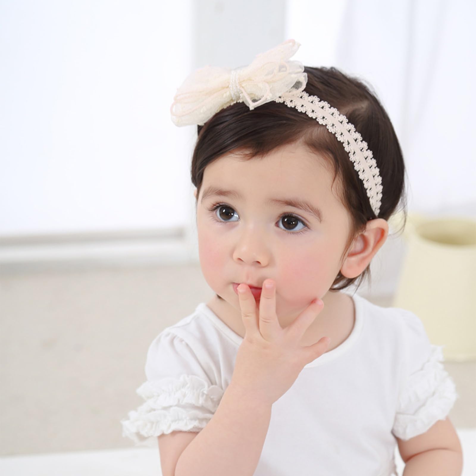 ickeyou baby bow headband lace detail highlights delicate design.
