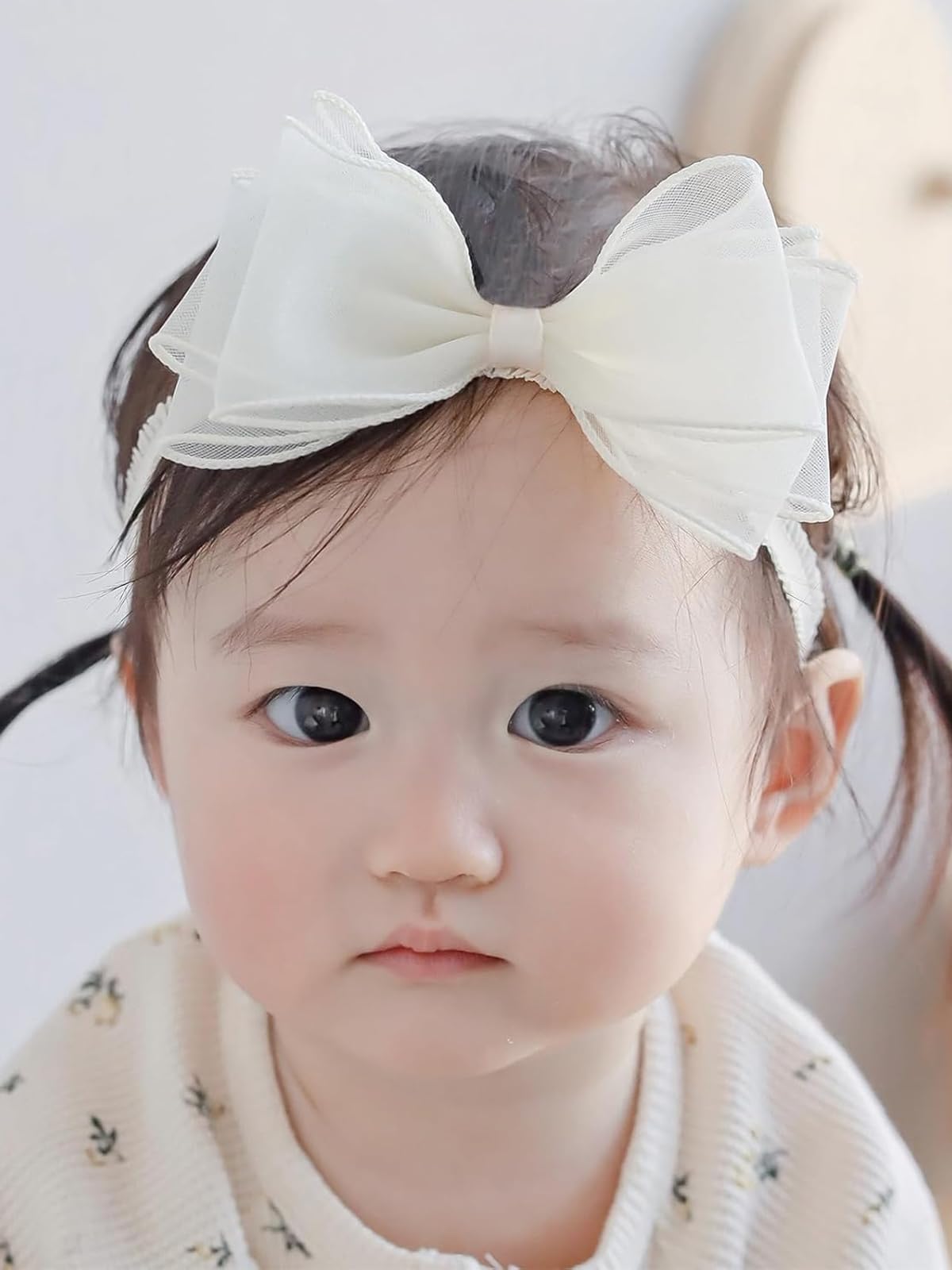 ICKEYOU baby girls lace bow headband closeup showing soft cotton comfort.