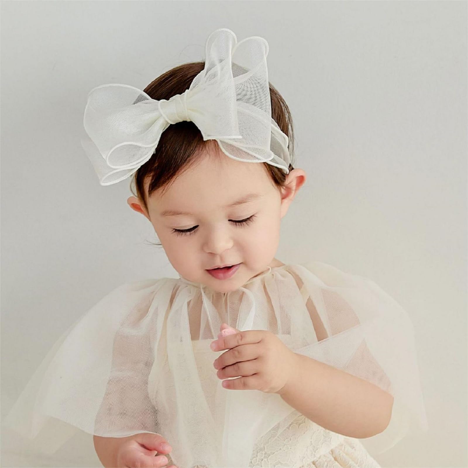 ICKEYOU floral bow headband for baby girls, ideal for christenings and birthday portraits.