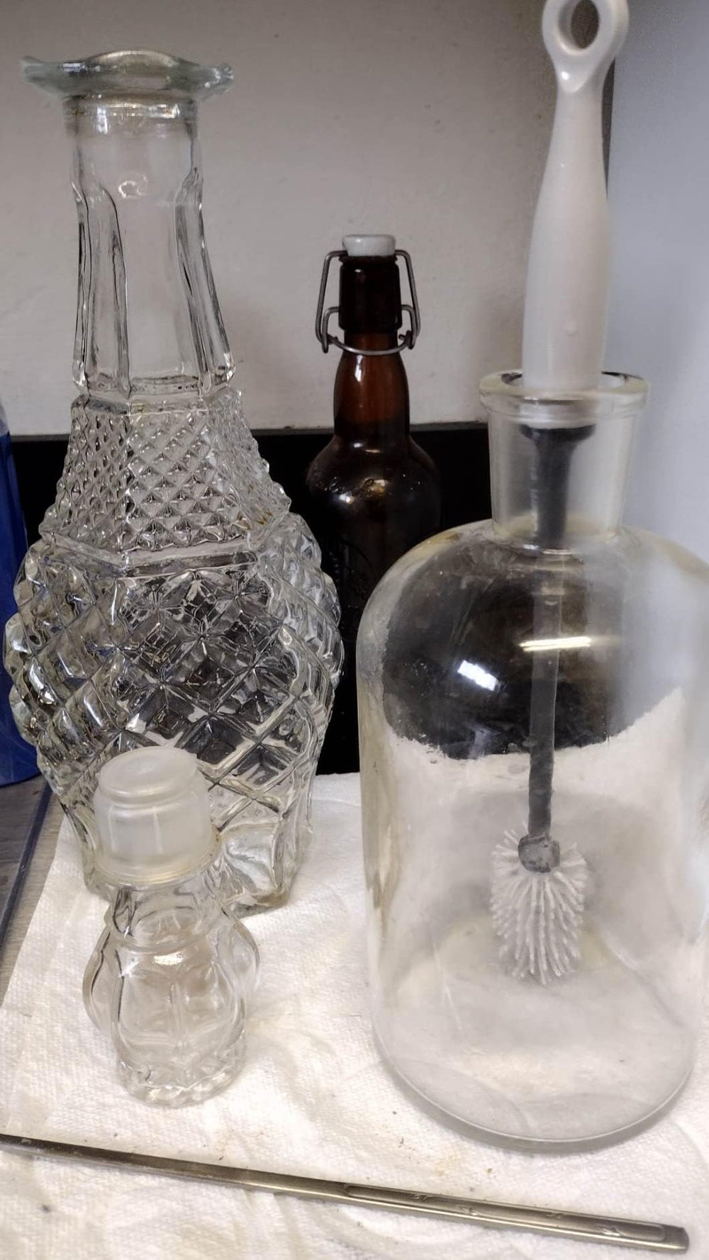 Iconikal bottle brush in use on a tumbler for thorough cleaning