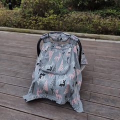 ICOPUCA car seat cover peep window for quick baby checks.
