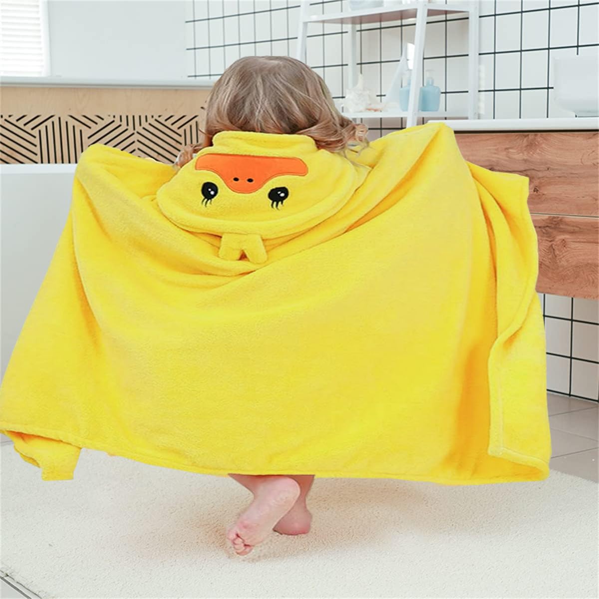 IFaryMes hooded-puppy design towel after-swim drying and smiles.