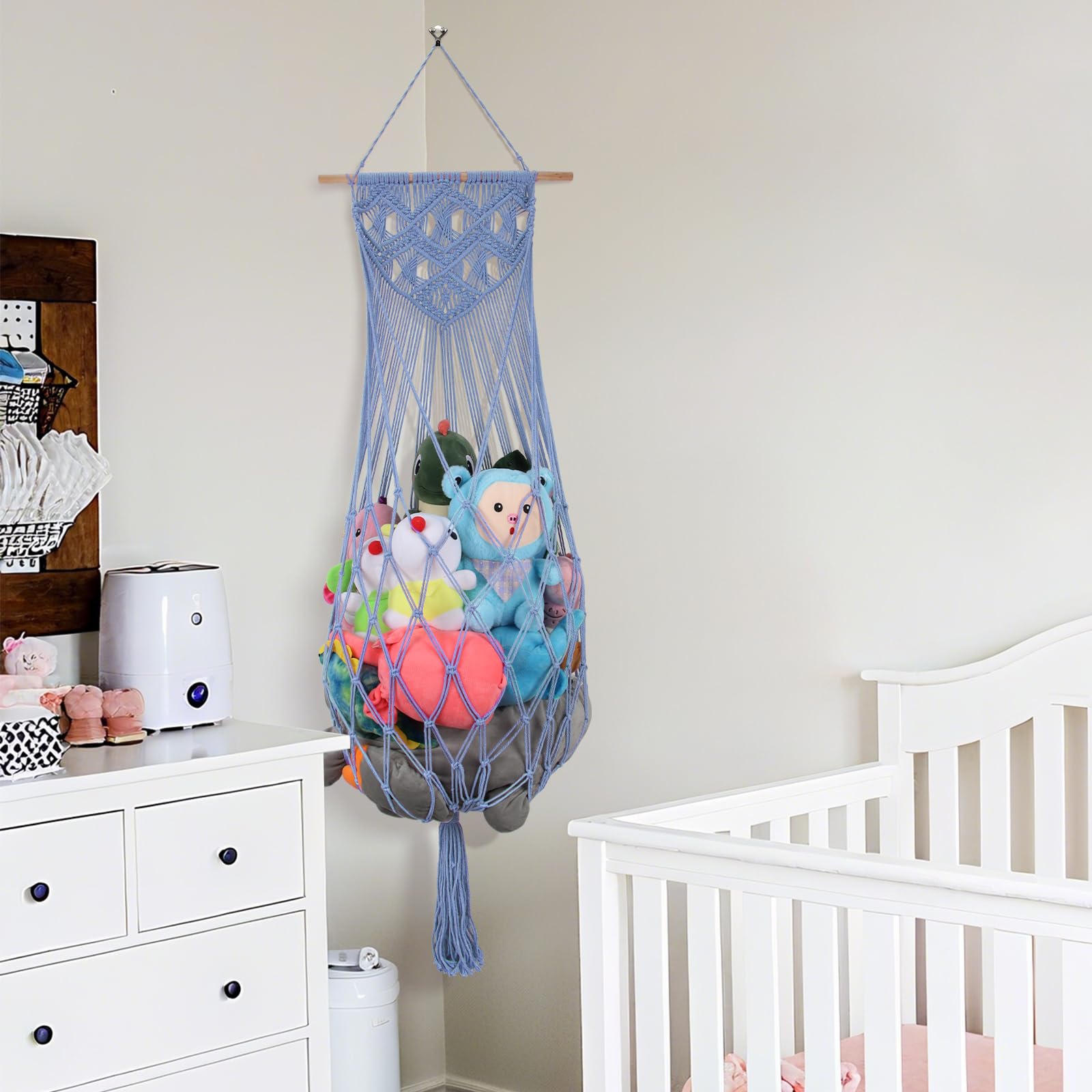 iHansee boho-macrame-toy-hammock-dark-blue adds stylish wall decor while keeping toys organized