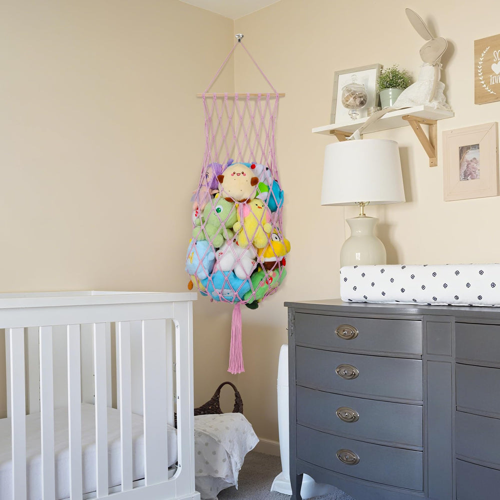 iHansee light pink toy hammock setup in a corner enhances room decor.