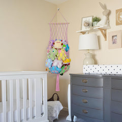 iHansee light pink toy hammock setup in a corner enhances room decor.