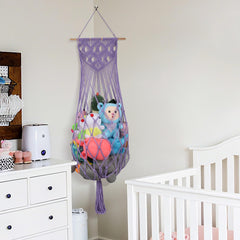 iHansee purple boho macrame toy net adds color to nursery decor.