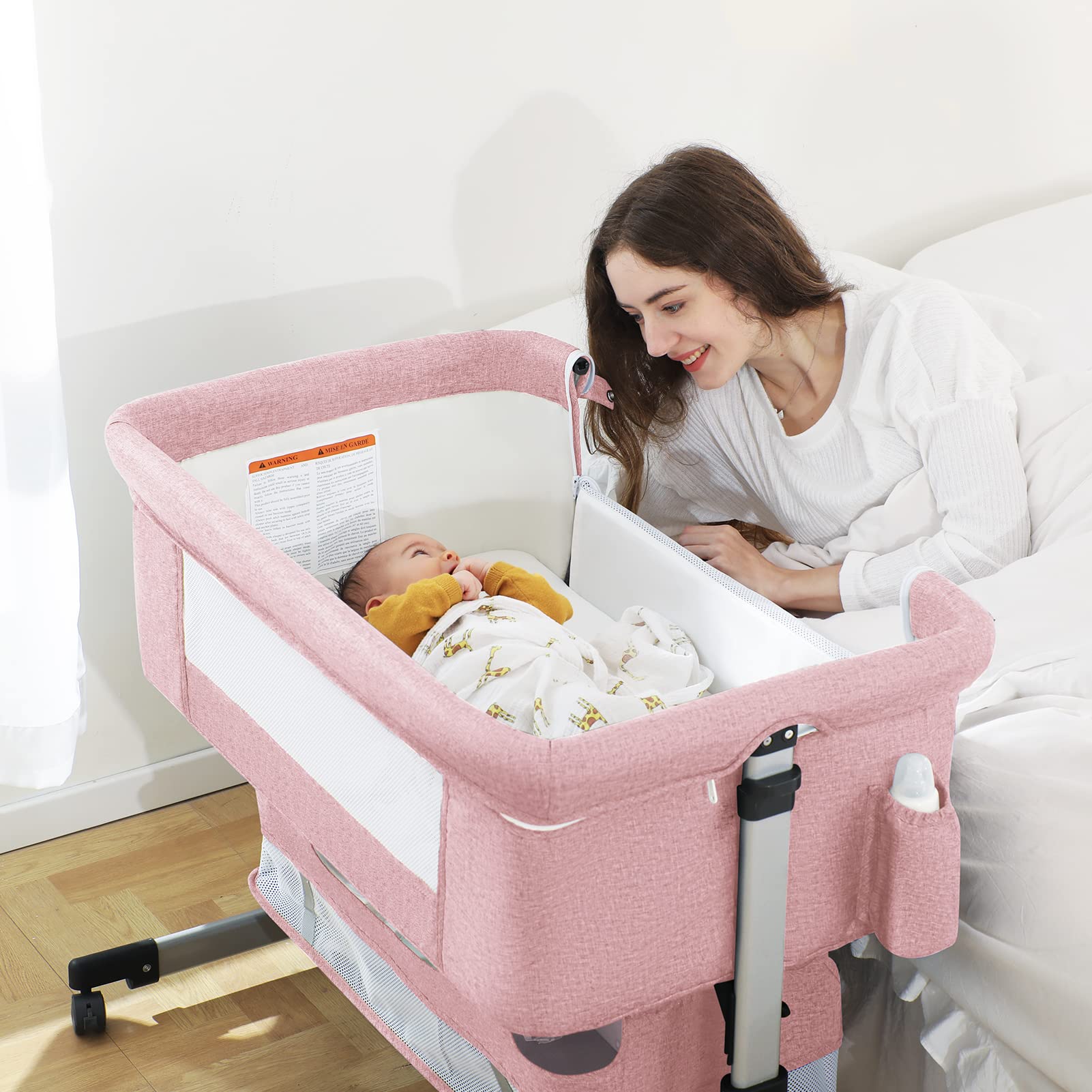 Ihoming bassinet with mosquito net offers protected sleep for baby.