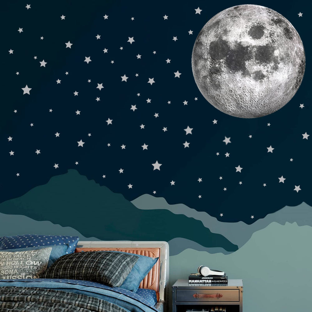 iinuu big moon wall decal creates a dreamy nursery focal point.