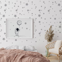 iinuu stars sizes variety enhances playful galaxy-inspired wall decor.