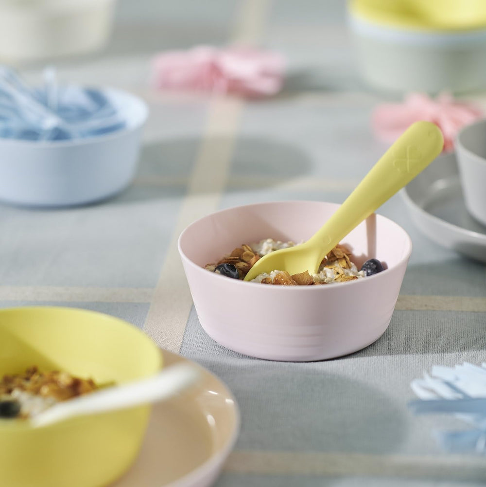 IKEA Kalas pastel tableware in a coordinated color scheme