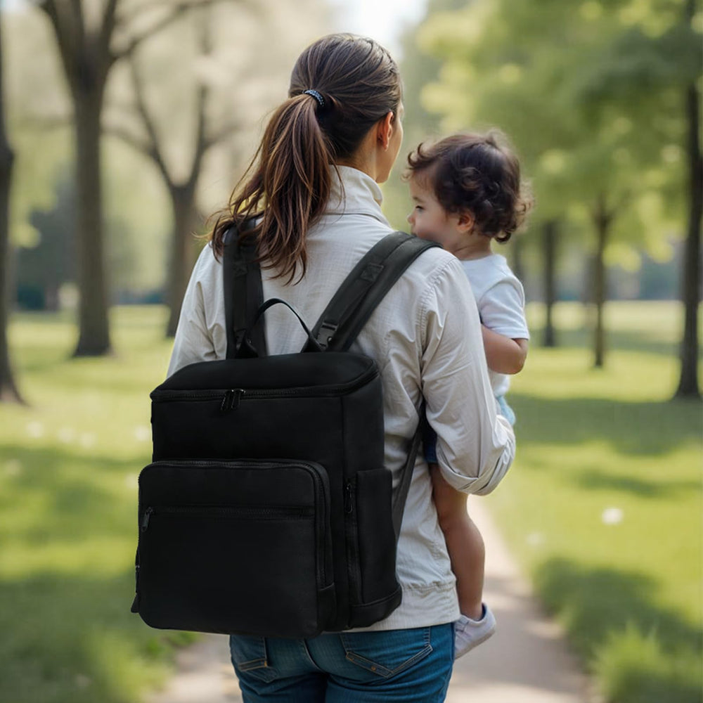 ILCOLPO diaper bag insulated pockets keep bottles at the right temperature on outings.