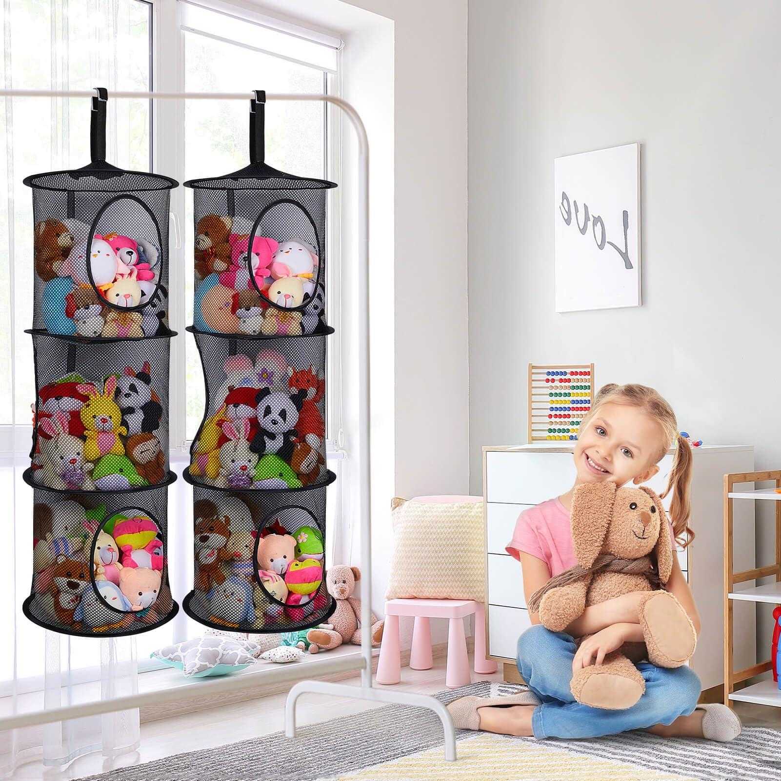 Basumee-stuffed-animals-hammock-mesh hangs toys neatly for quick access.