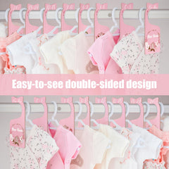Imtively wooden clothes organizer blends soft finish with boho nursery decor.