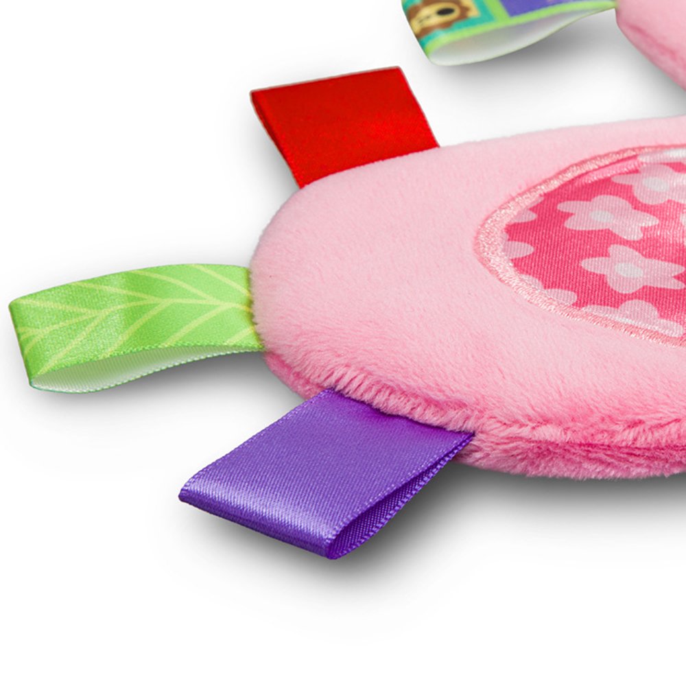 Inchant Taggy blanket captured during cozy snuggle moment