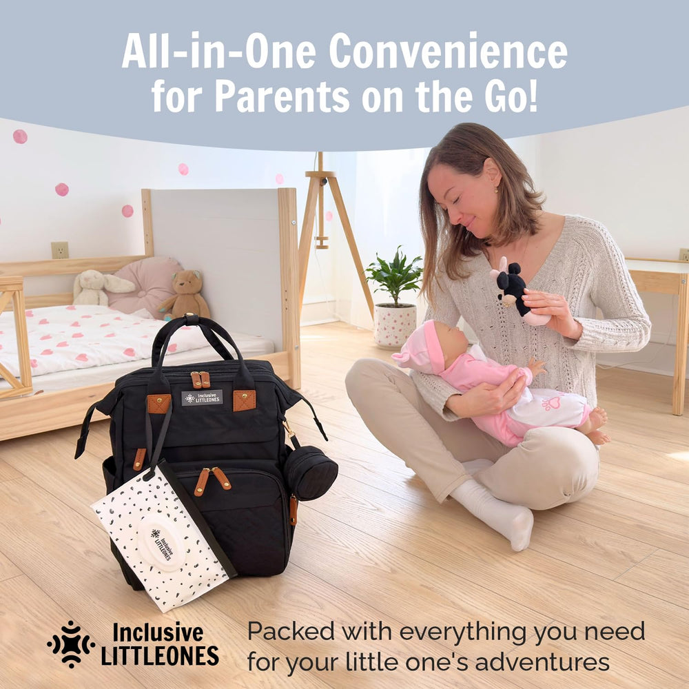 Inclusive LittleOnes stroller straps attach securely for hands-free transport.