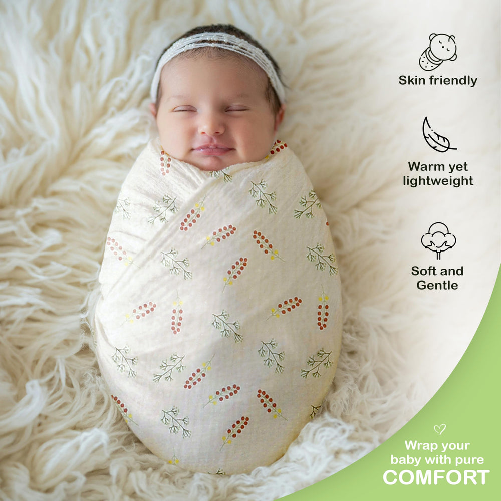 Infancie muslin blanket showcasing easy-care, machine-washable fabric.