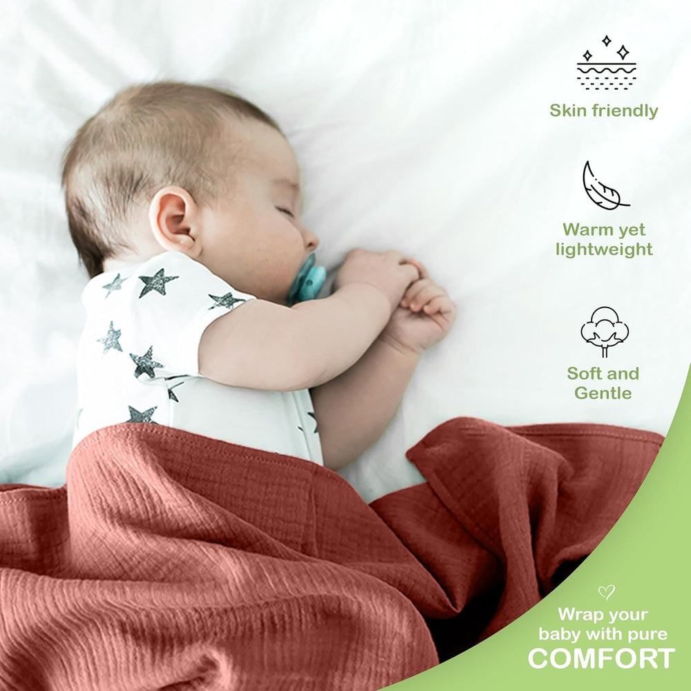 Infancie muslin blanket care label—machine washable for easy maintenance.