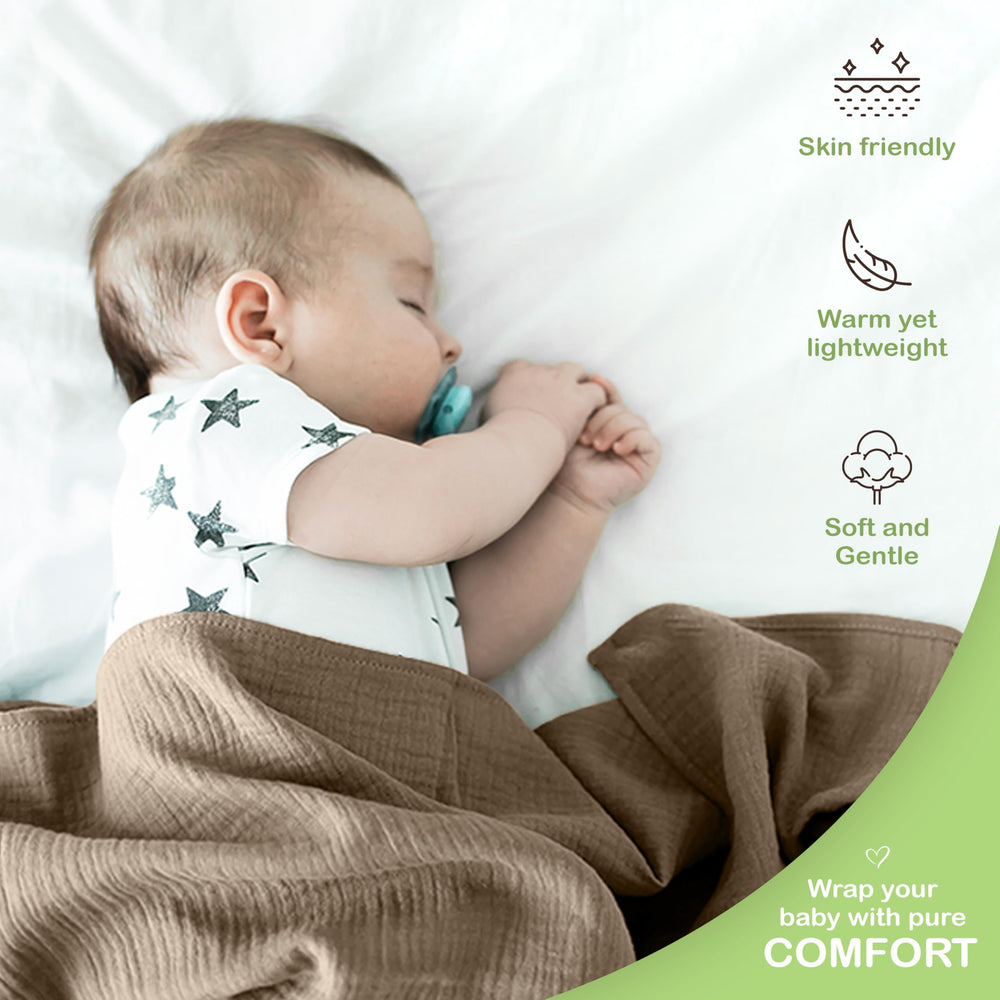 Infancie muslin blanket olive ivory tones complements nursery decor