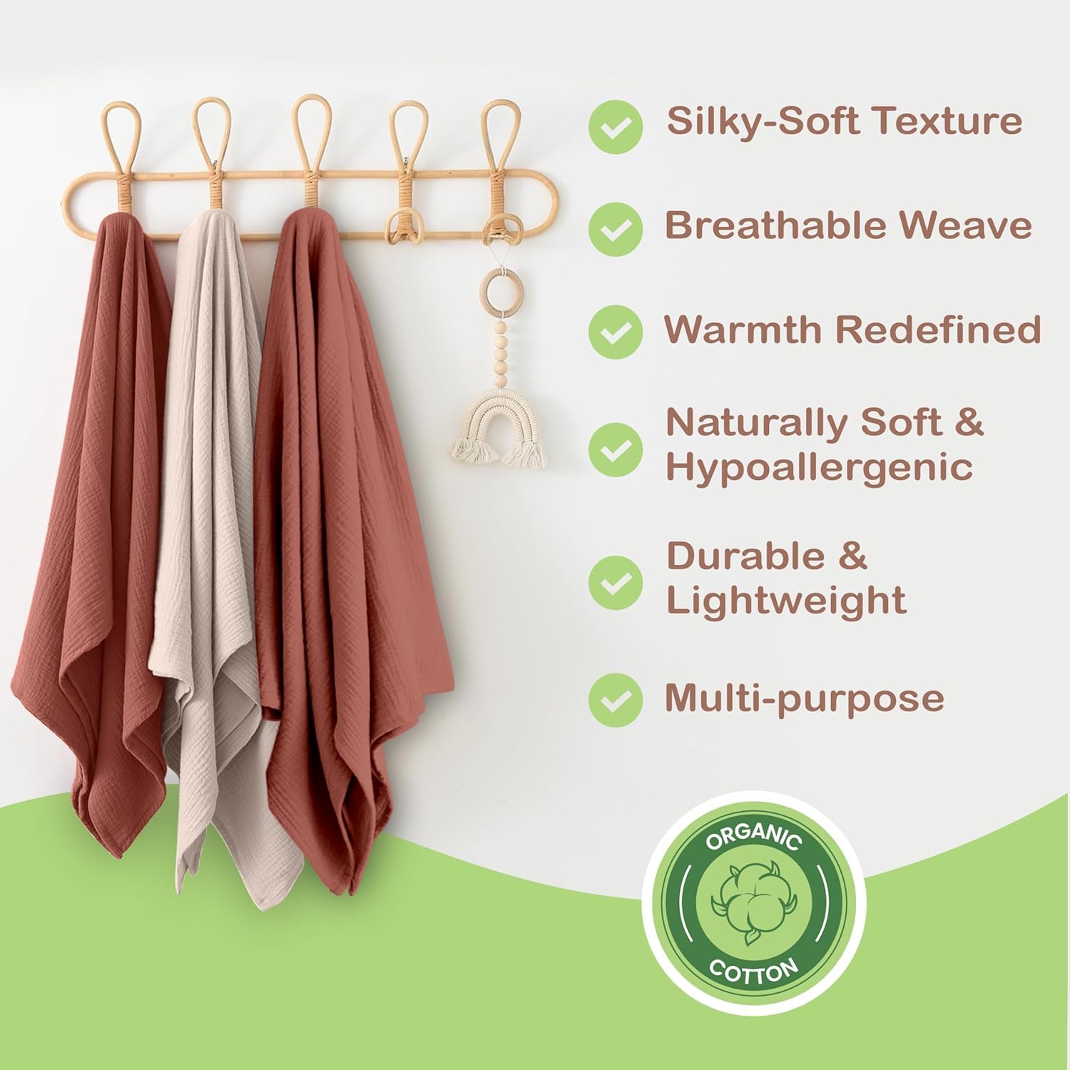 Infancie muslin blanket in nursery rust ivory—cozy, calming ambiance for baby's space.