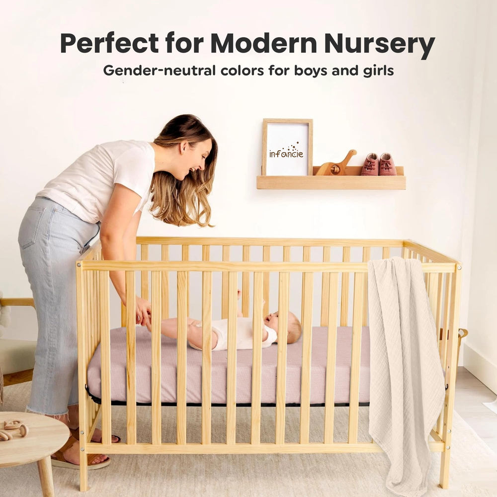 Infancie muslin crib sheets on standard crib demonstrates perfect 28x52 fit