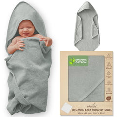 Infancie hooded towel folded in moss green shows plush softness after bath.