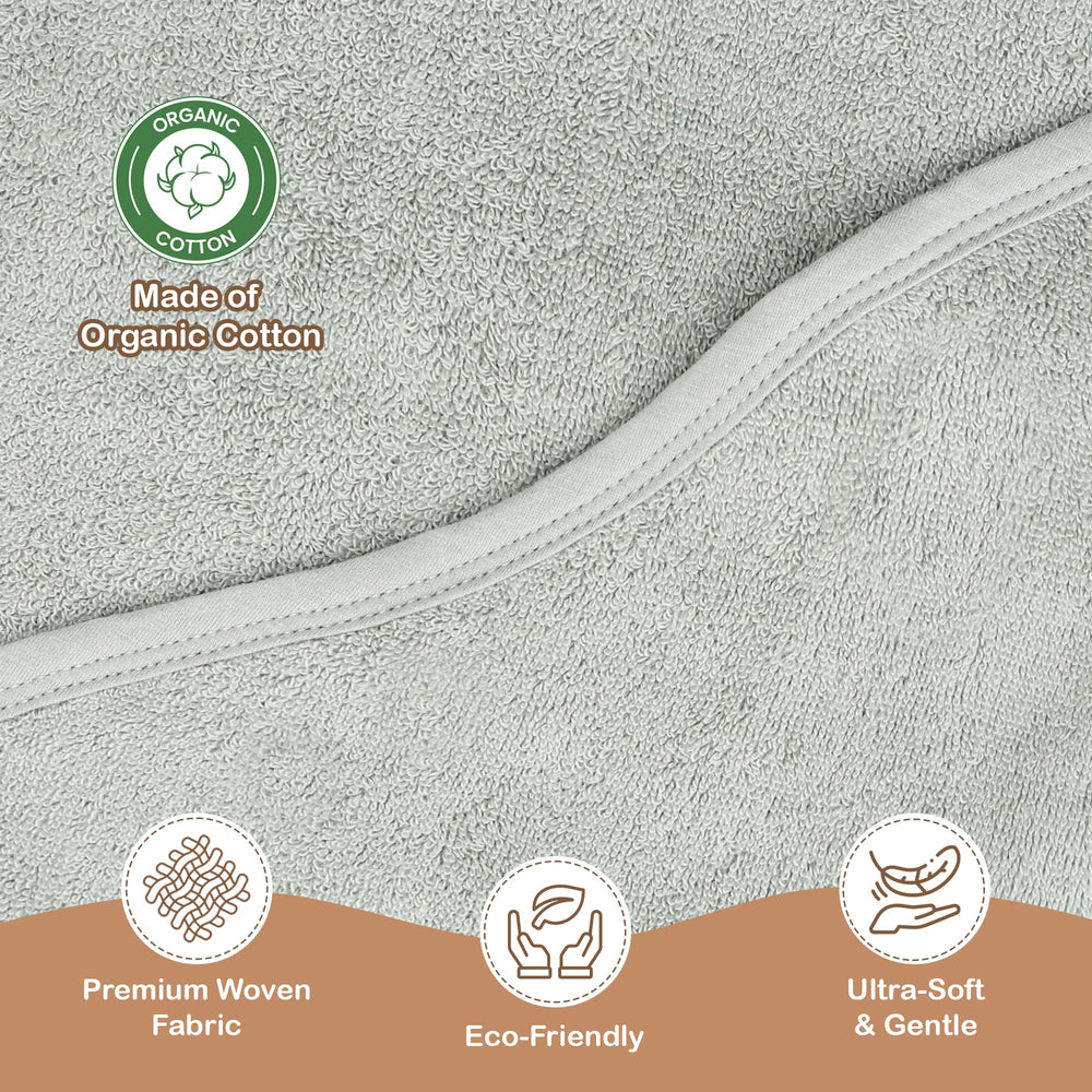 Infancie moss green plush towel ready to wrap baby after bath.