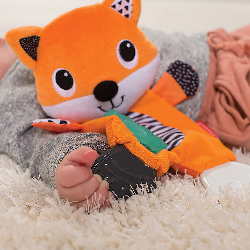 Infantino Cuddly Teether Fox with chewy feet and teething ring for early grip.