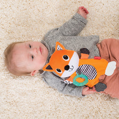 Infantino Cuddly Teether Fox featuring crinkle sounds when squeezed for sensory play.
