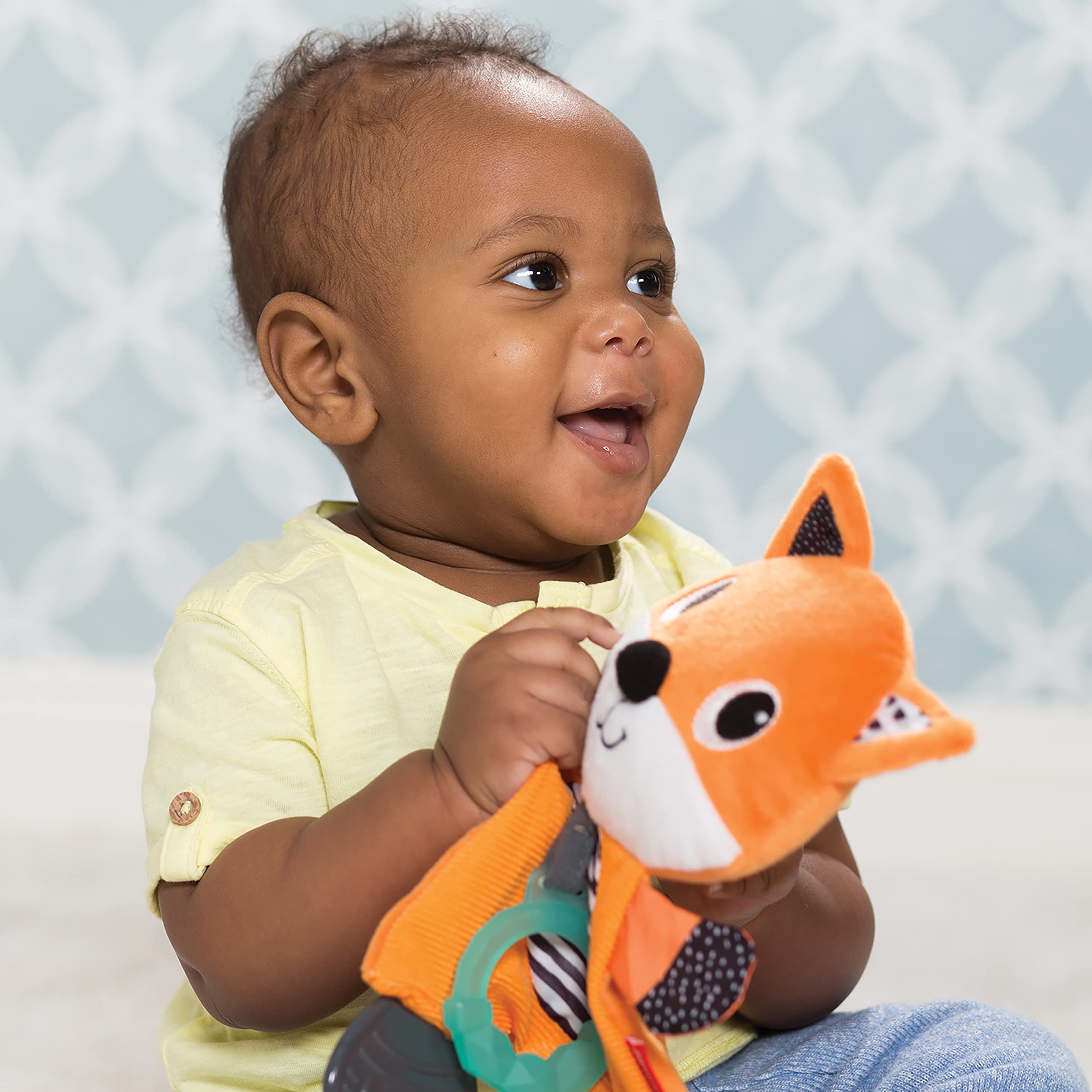 Infantino Cuddly Teether Fox close-up of three textured surfaces for varied teething sensations.