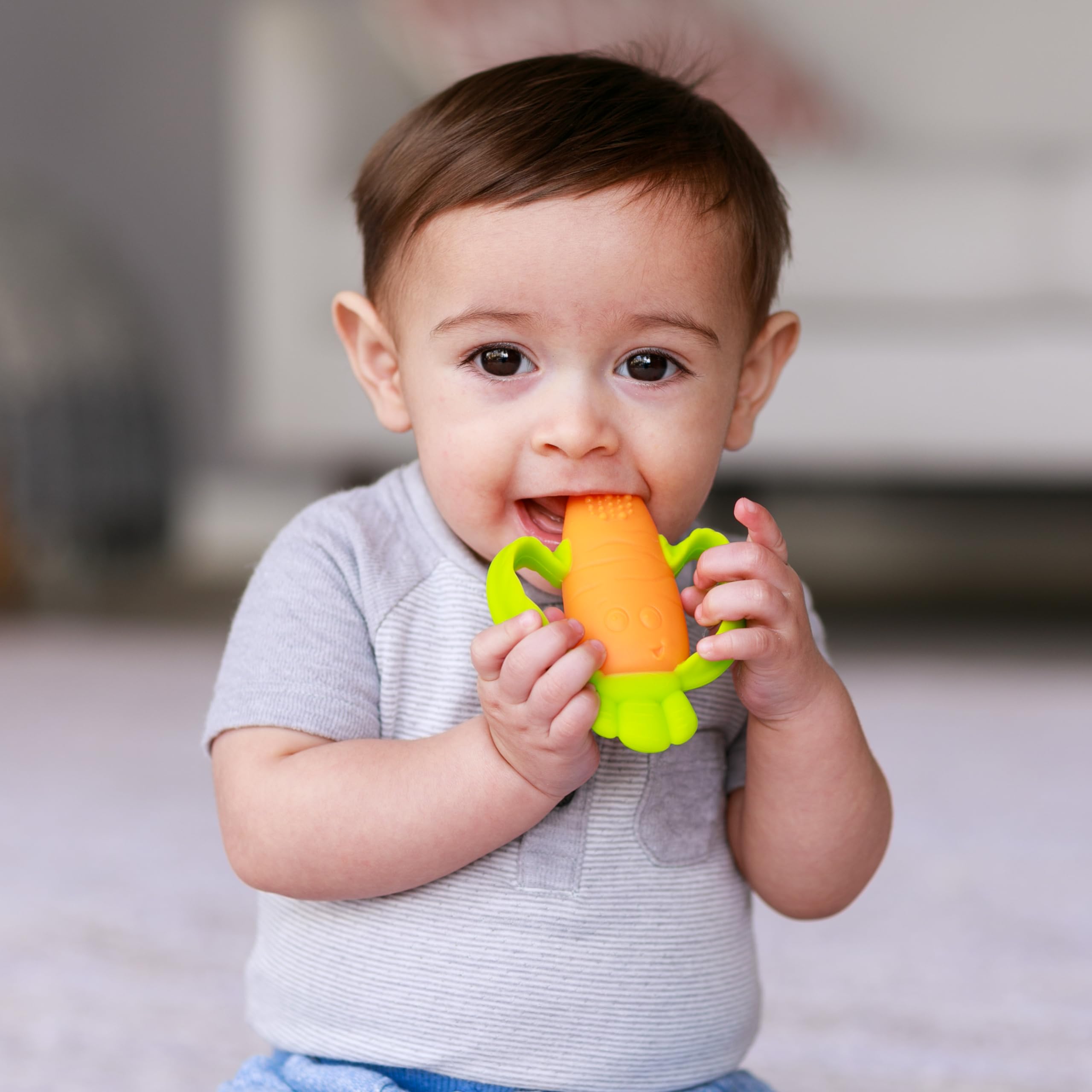 Infantino Lil’ Nibbles teether travel-friendly in diaper bag scene.