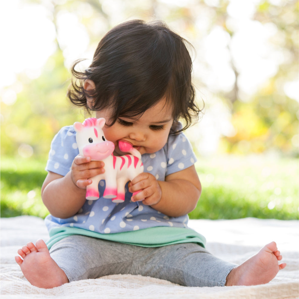 Infantino Teether Toy Squeeze and TeeThe Zebra grasp-friendly hold supports tiny hands.