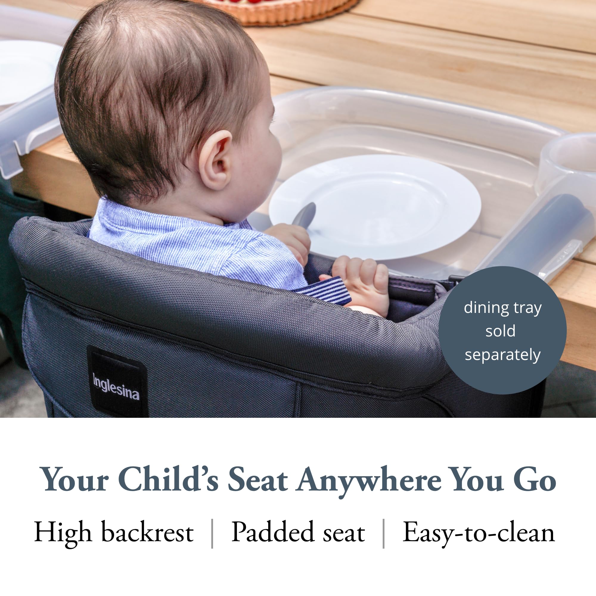Inglesina Fast Table Chair attached to a table for safe feeding at meals.
