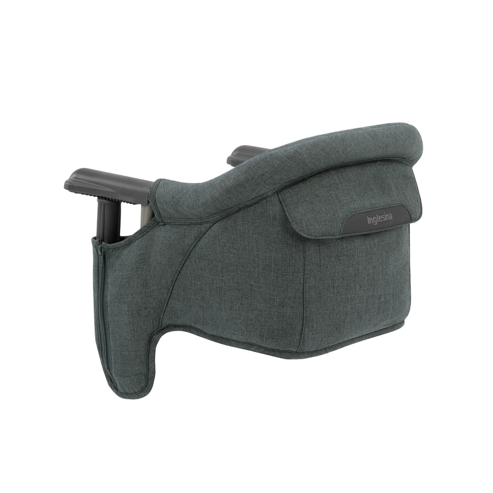 Inglesina Fast Table Chair collapsible fold for compact travel and quick setup.